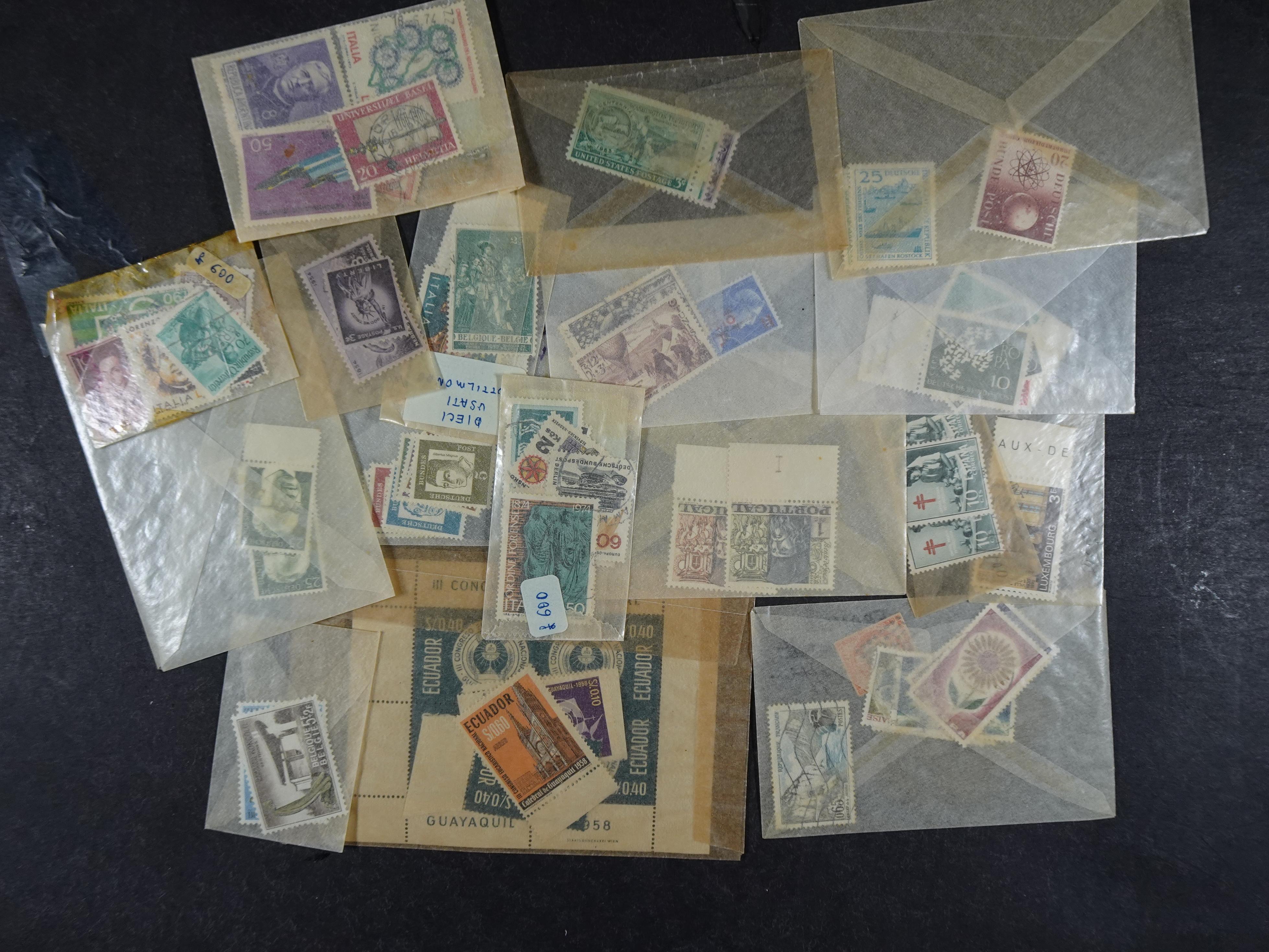 Gehele wereld in zakjes groten deels postfris. 3