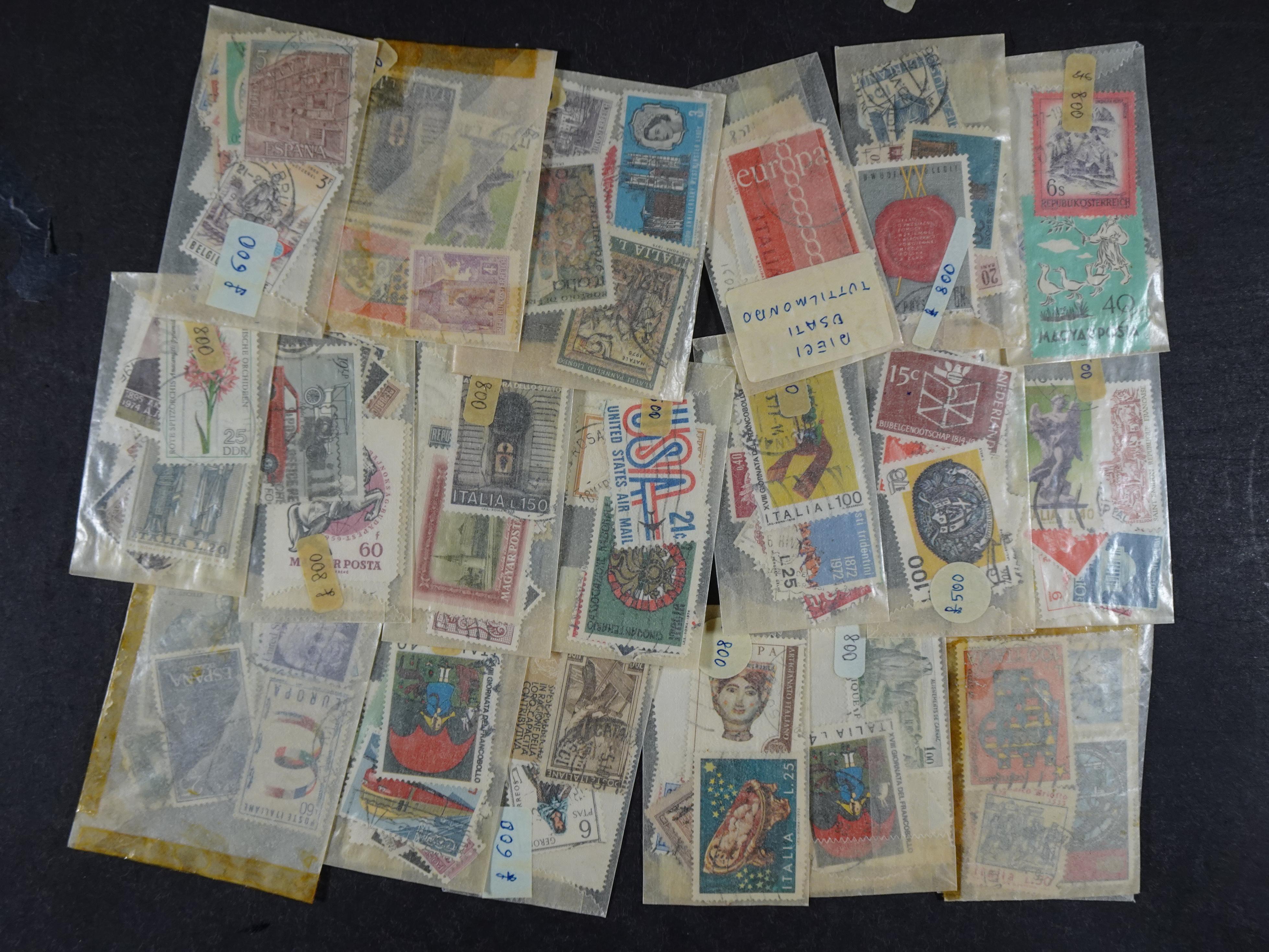 Gehele wereld in zakjes groten deels postfris. 6