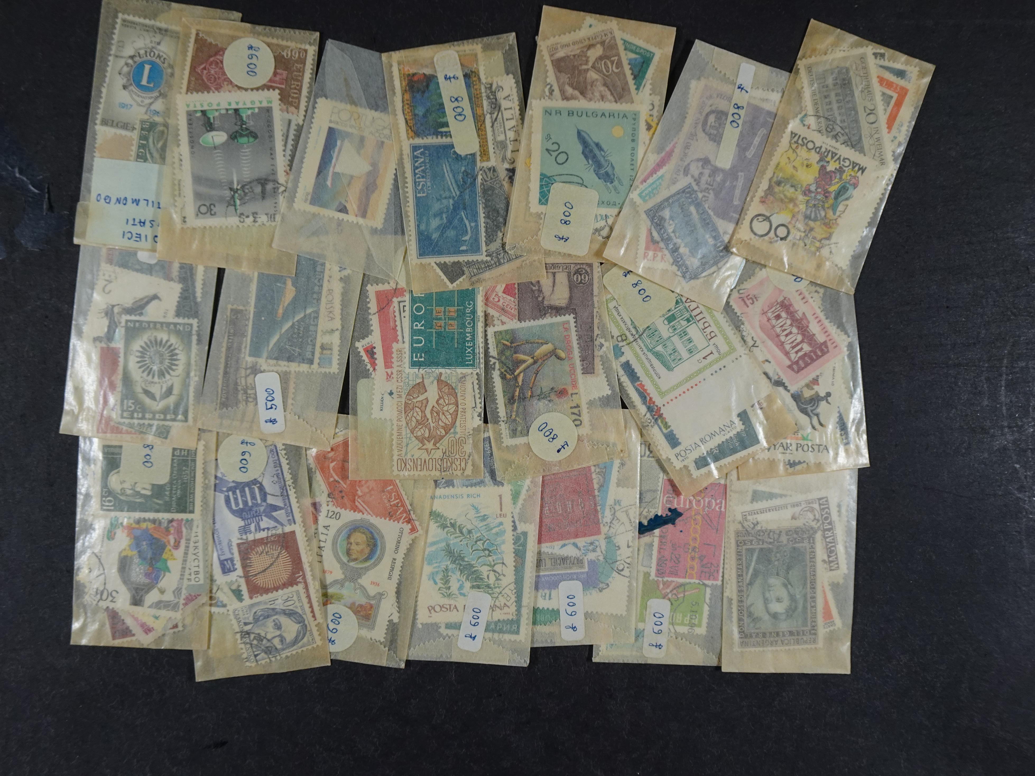 Gehele wereld in zakjes groten deels postfris. 15