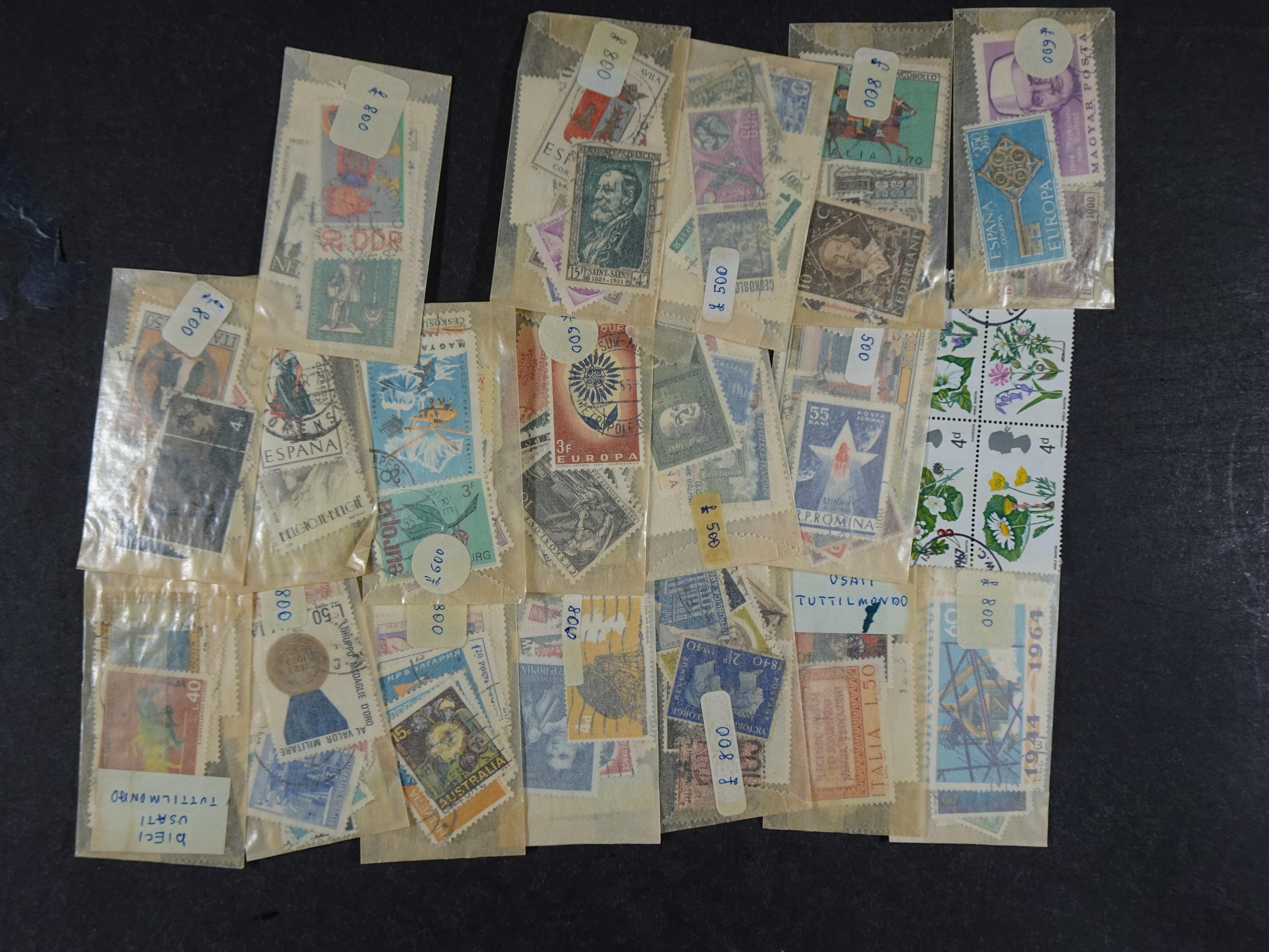 Gehele wereld in zakjes groten deels postfris. 16