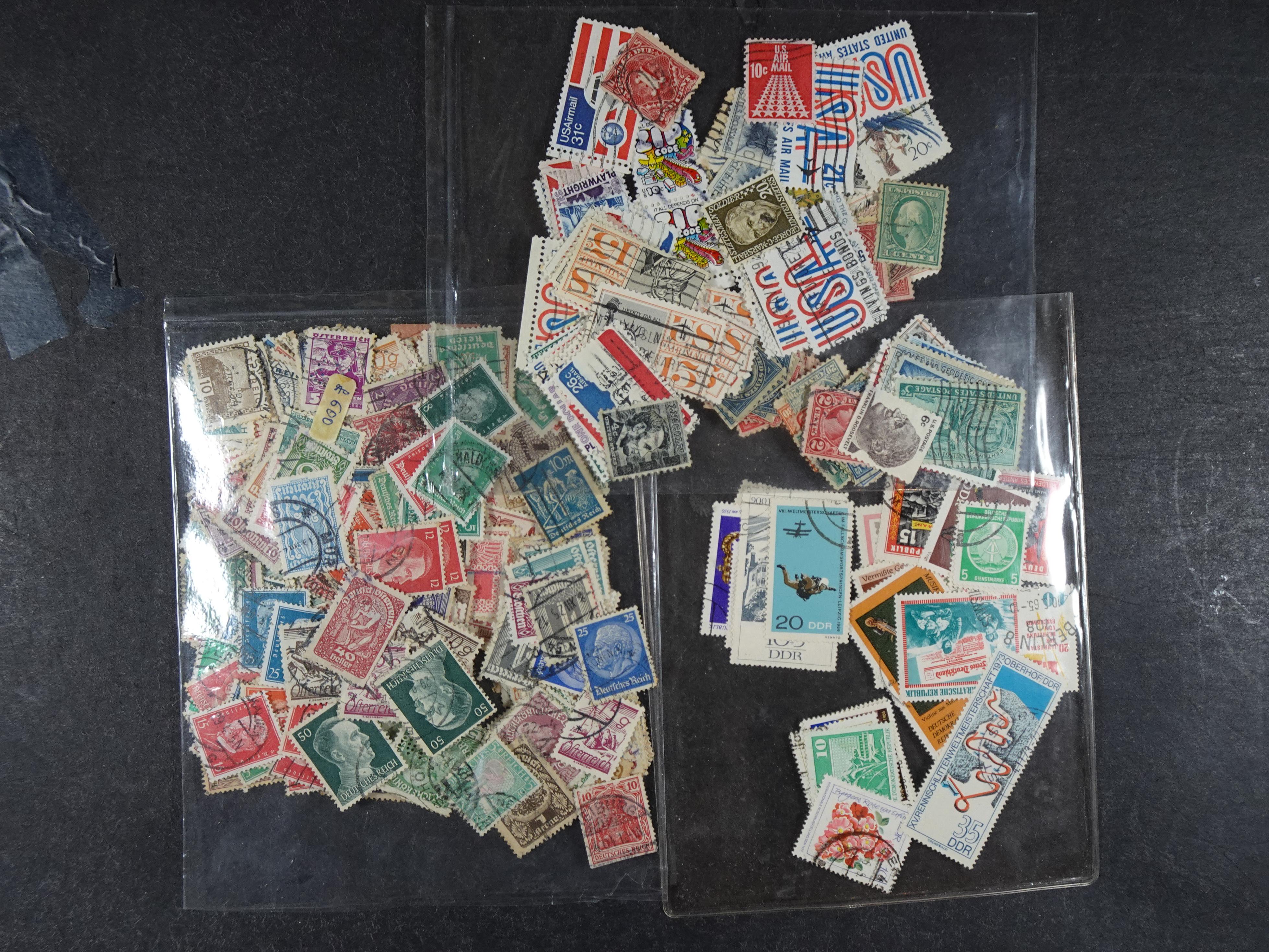 Gehele wereld in zakjes groten deels postfris. 20